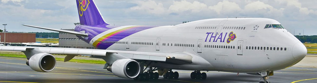 Thai Airways plane landing.